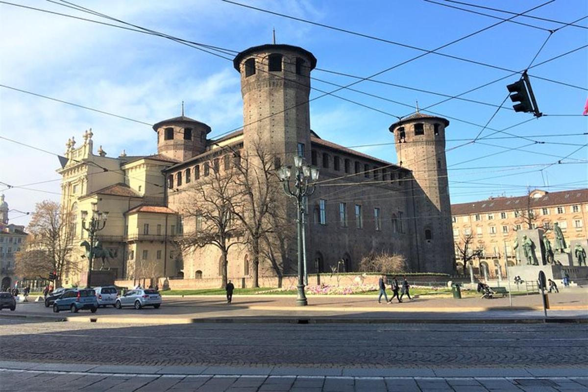 a large building with three towers on top of it
