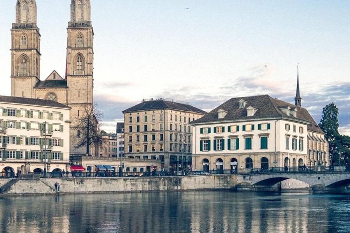 a bridge over a river in a city with buildings