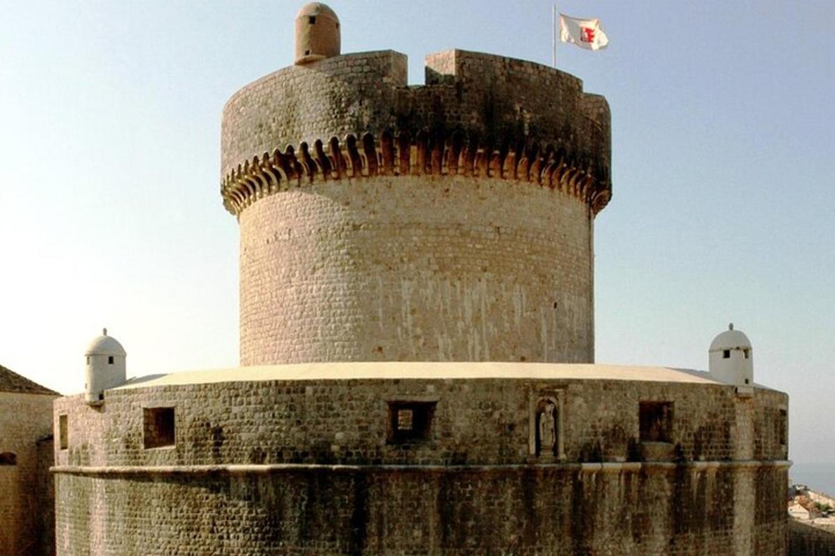 a castle with a flag on top of it
