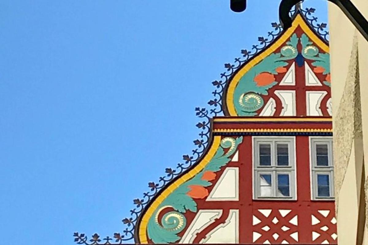 a building with a christmas tree on top of it