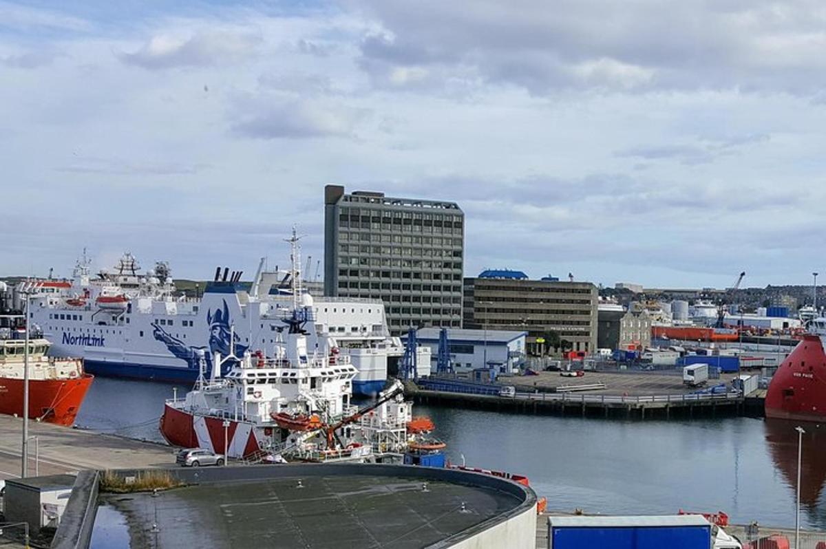 a group of boats docked in a harbor