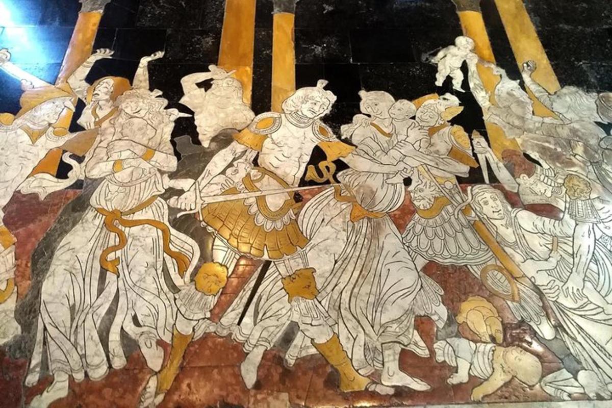 a painting of a group of animals on a wall
