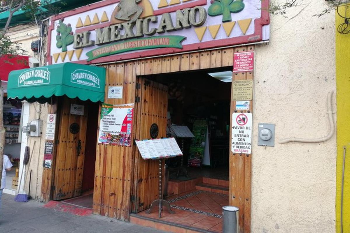 a store front of a restaurant with a sign