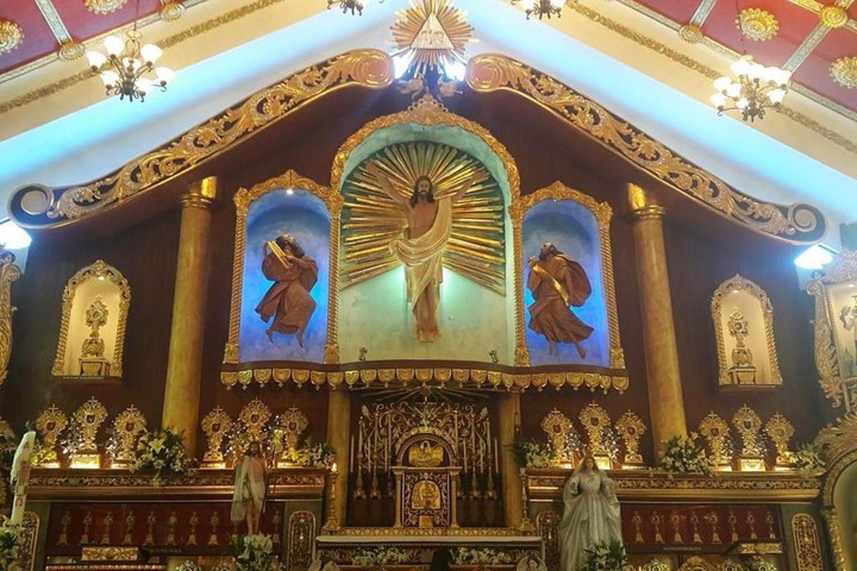 an altar of a church with paintings on the ceilings