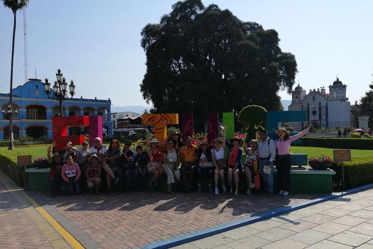 a group of people are posing for a picture