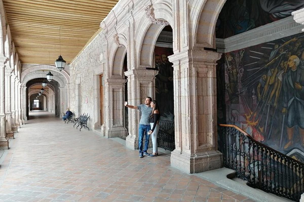 a man standing in a hallway in a building