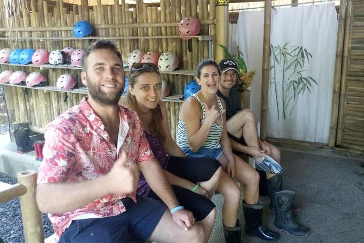 a group of people are sitting in a room