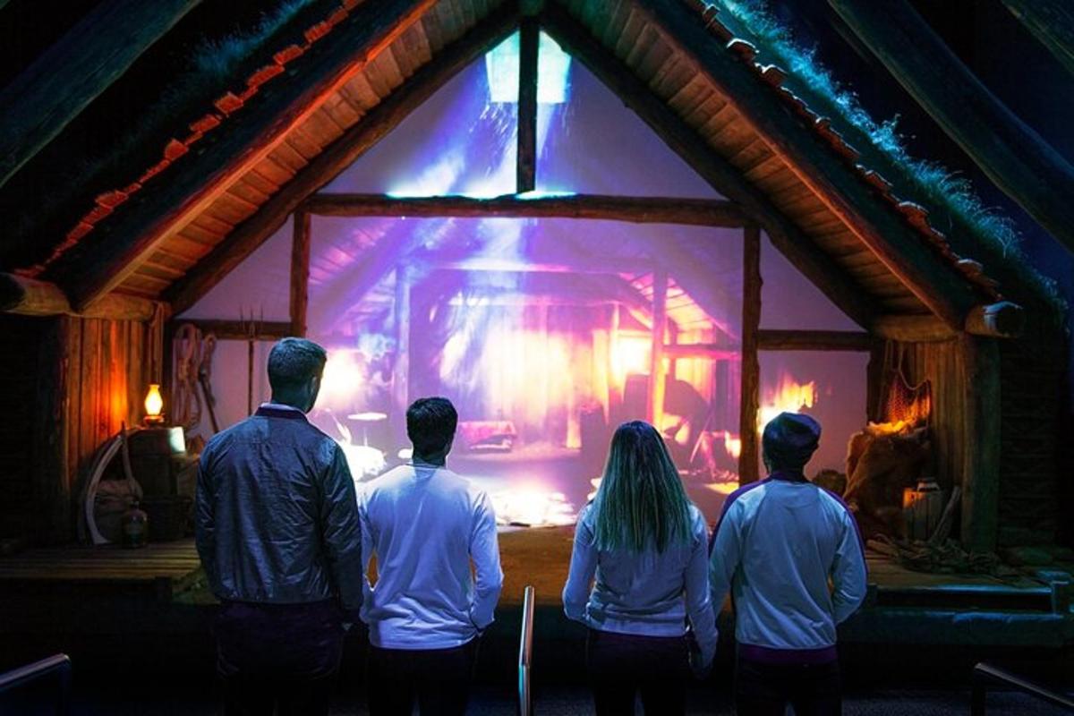 a group of people standing in front of a fire