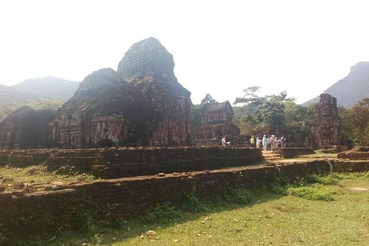 a group of people standing in front of a temple