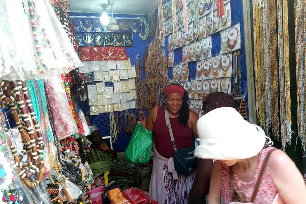a group of people standing in a shop in a store