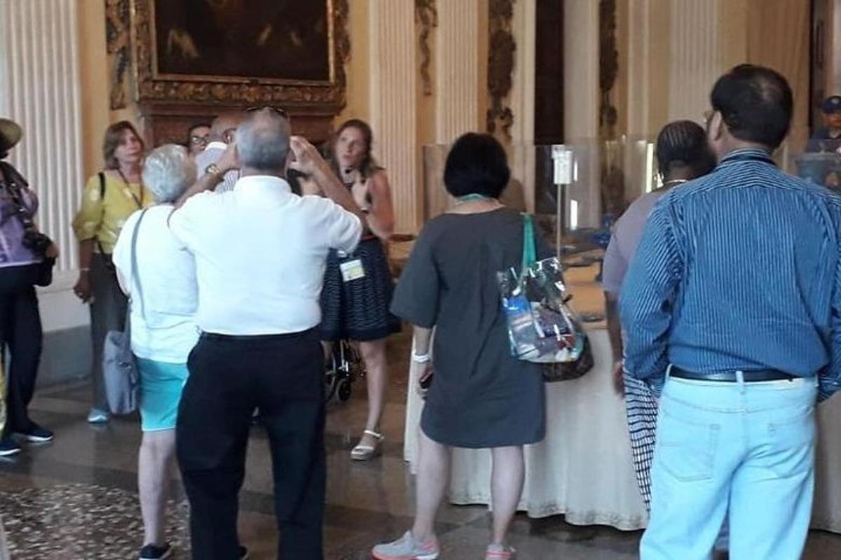 a group of people standing in a room