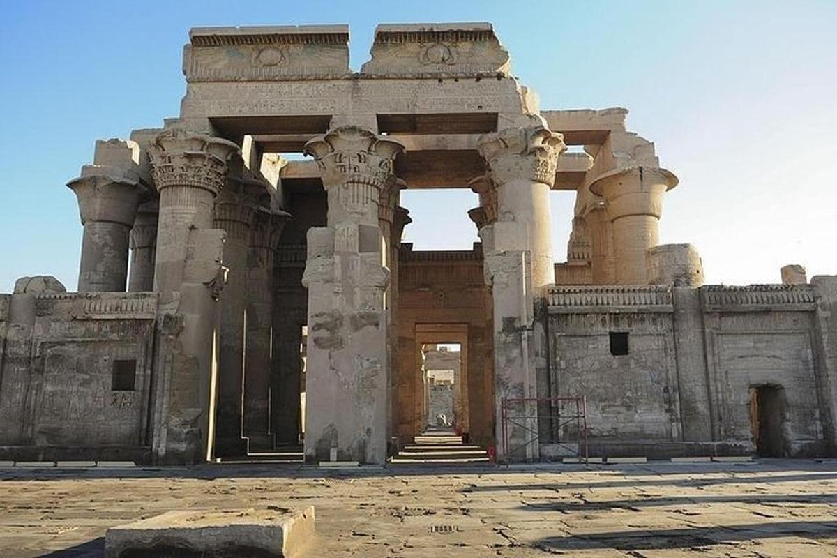a large building with an arch in the middle