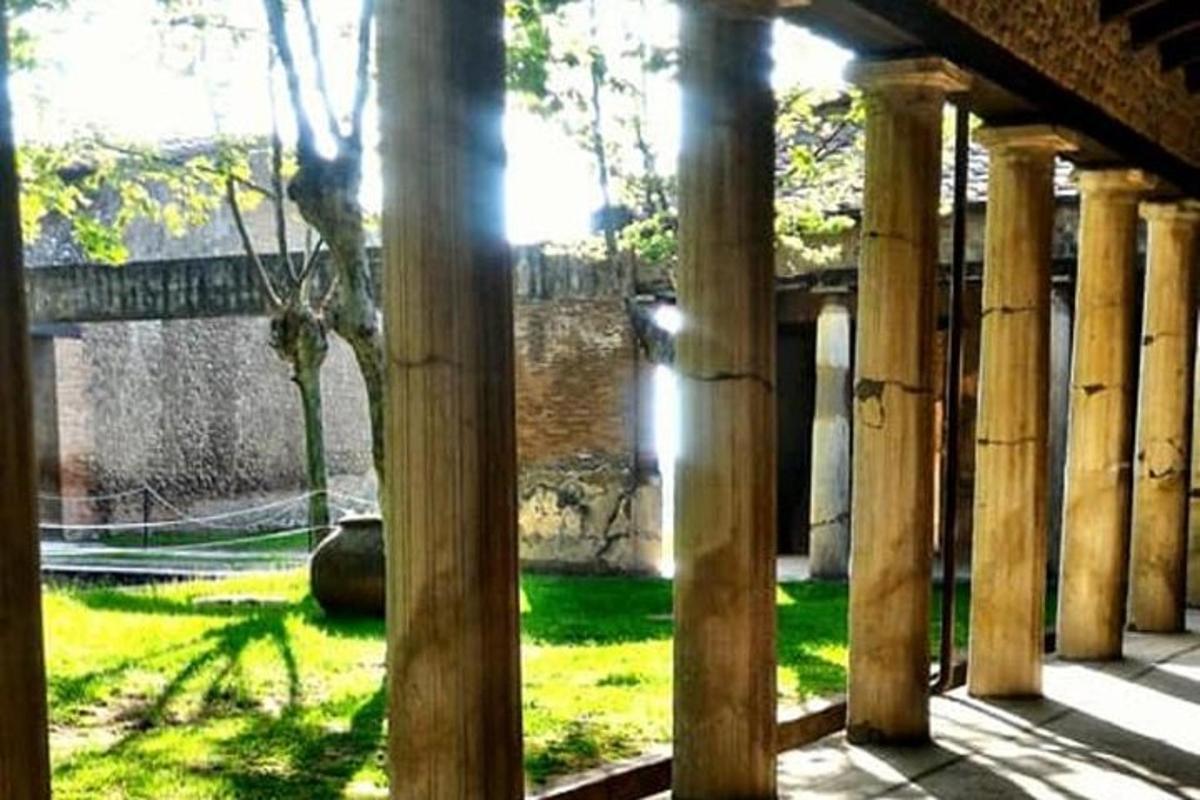 a view of a building with wooden pillars