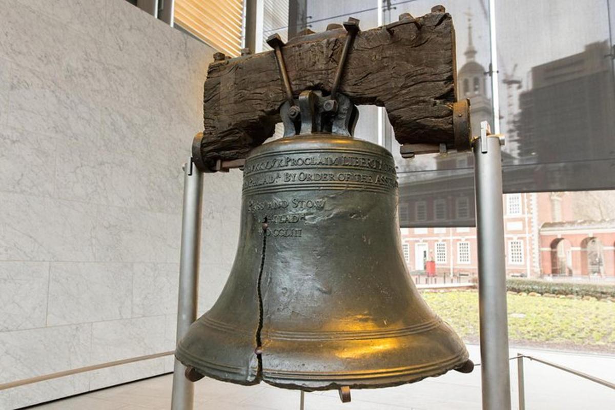 a bell hanging from the side of a building