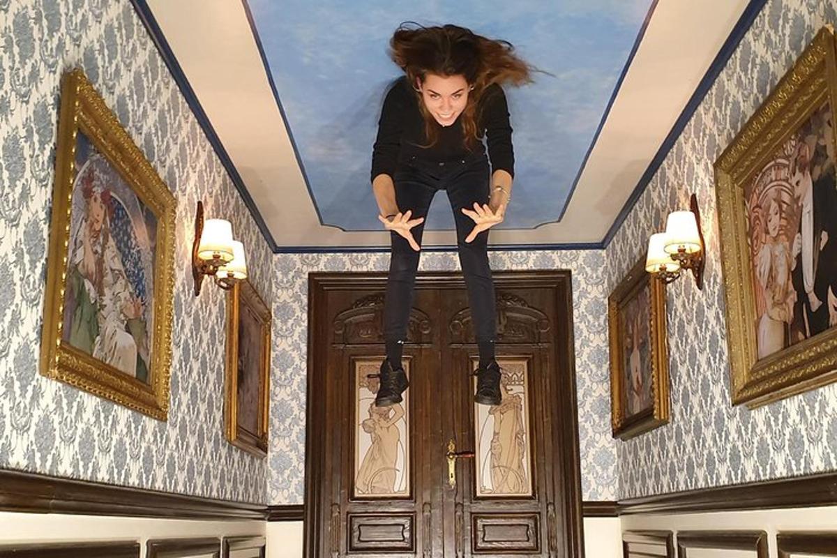 a woman jumping in the air on top of a door