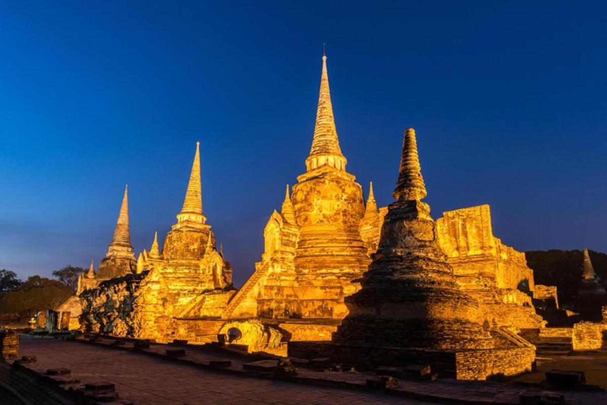 a large white building with many spires on it