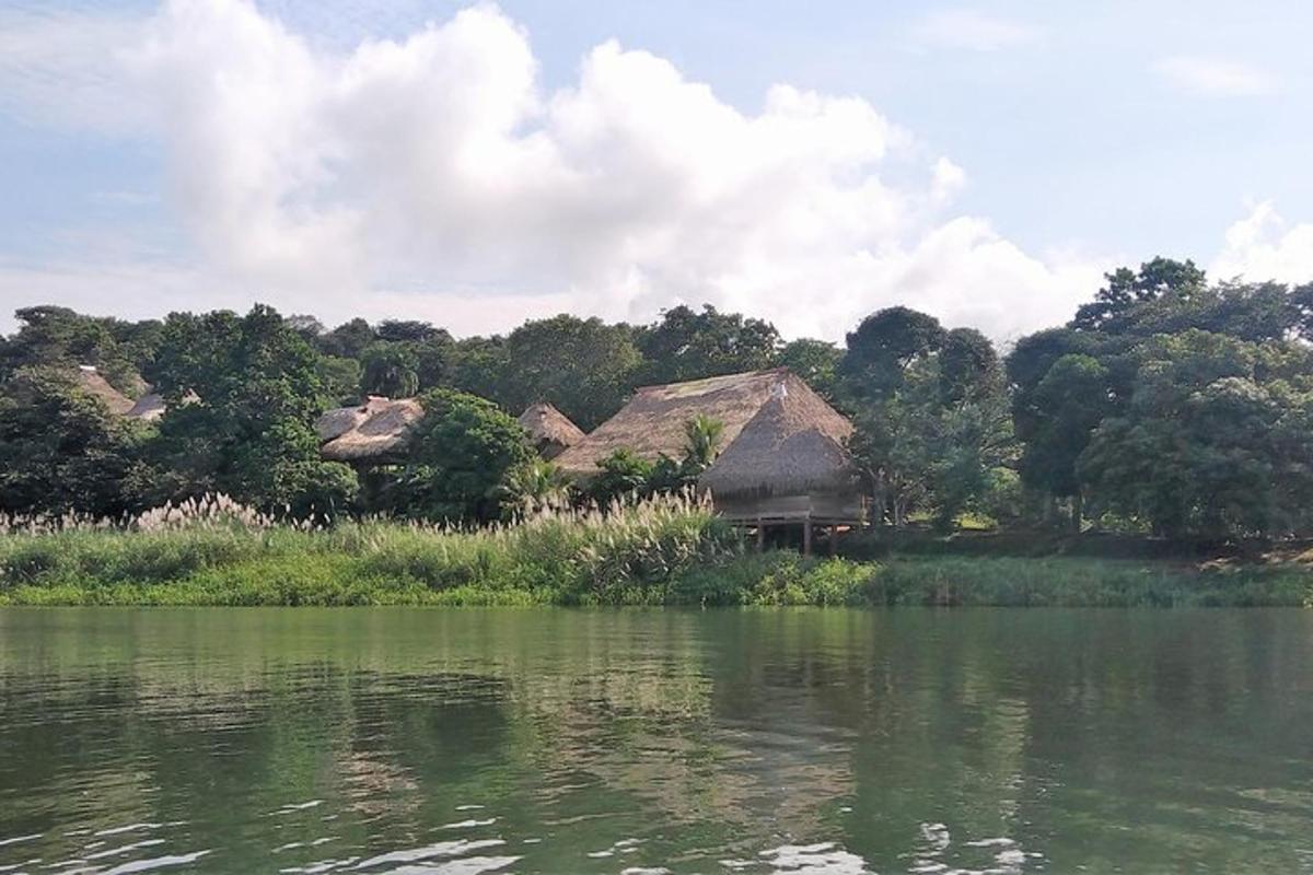 a house on the shore of a body of water