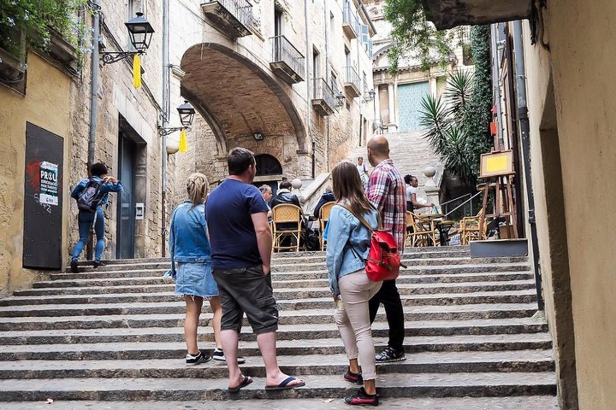 a group of people standing on some stairs