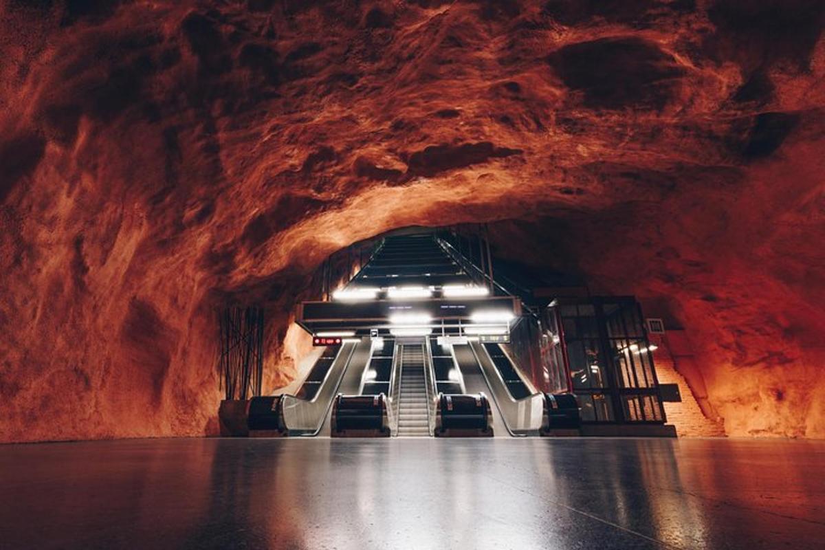 a tunnel in a cave with stairs in it