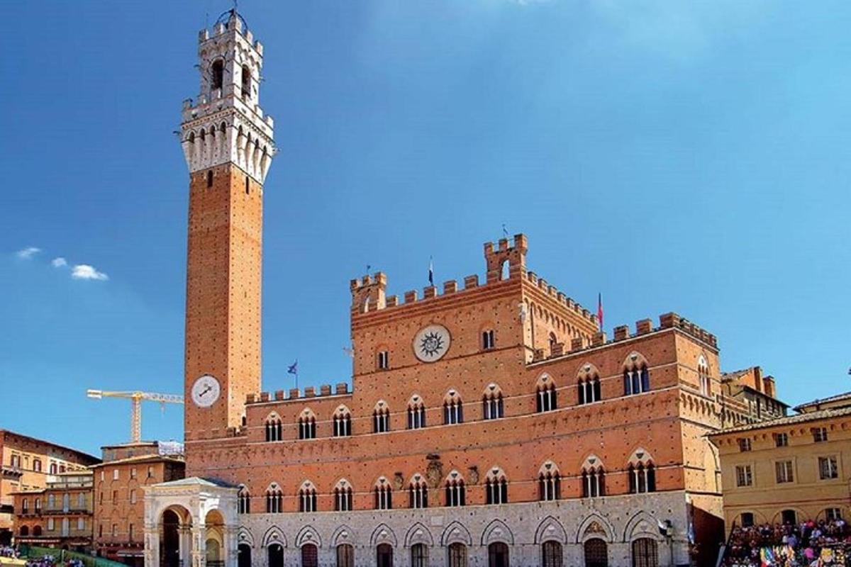 a large brick building with a clock tower on it