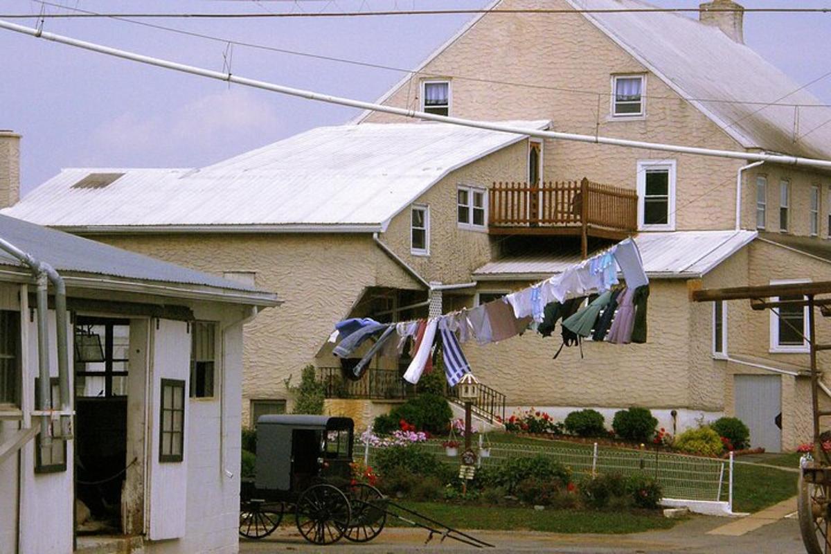 a house with clothes hanging on a clothes line
