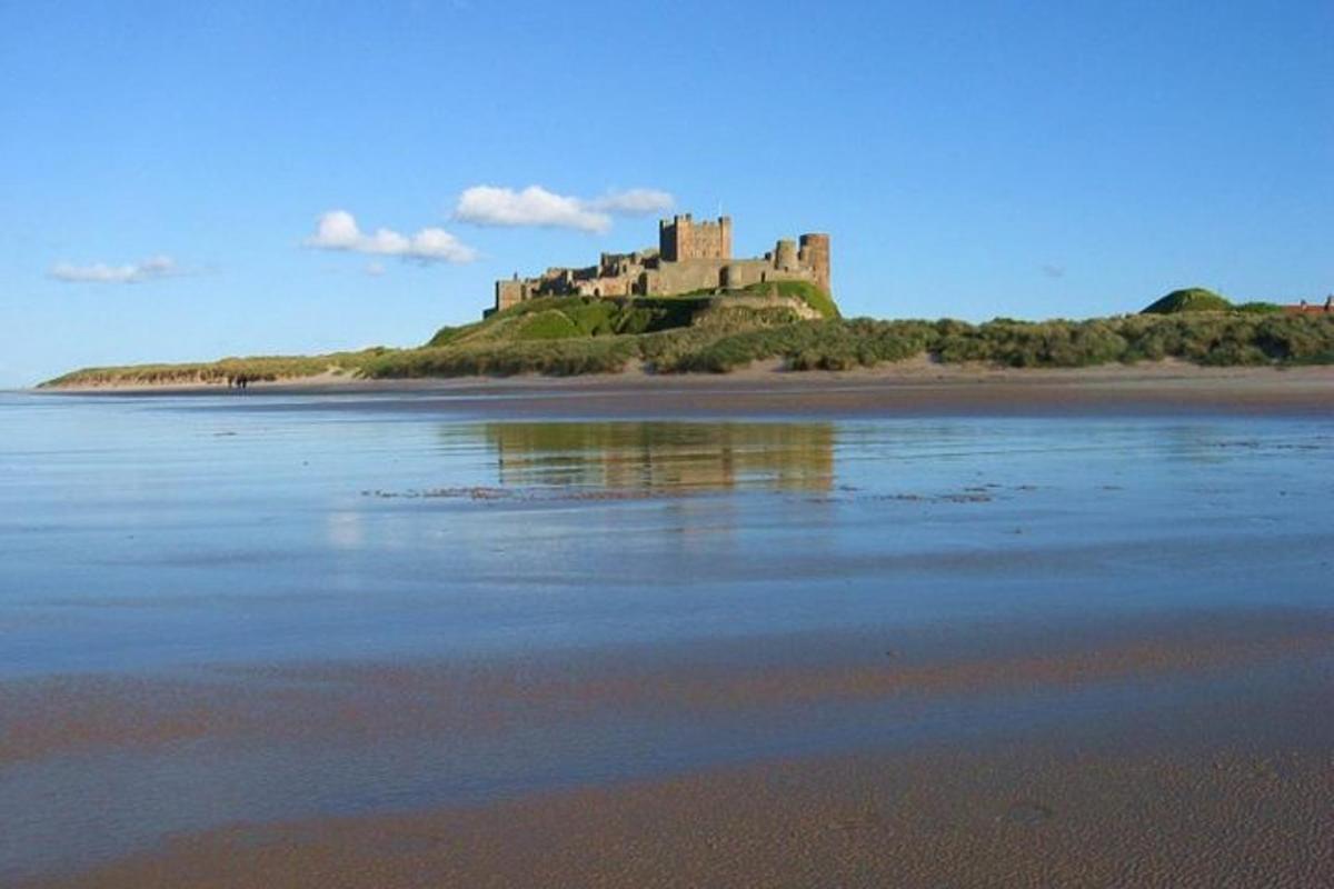 a castle sitting on an island in the water
