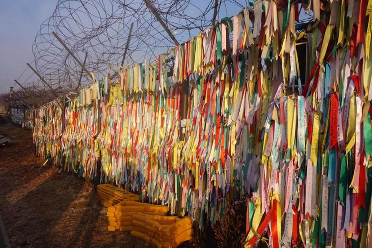 a wall filled with lots of different colored tags