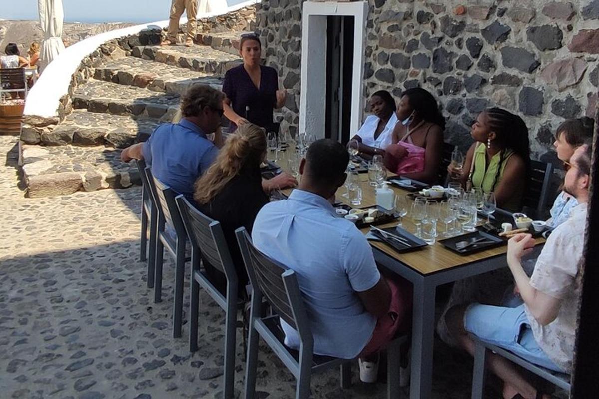 a group of people sitting around a table