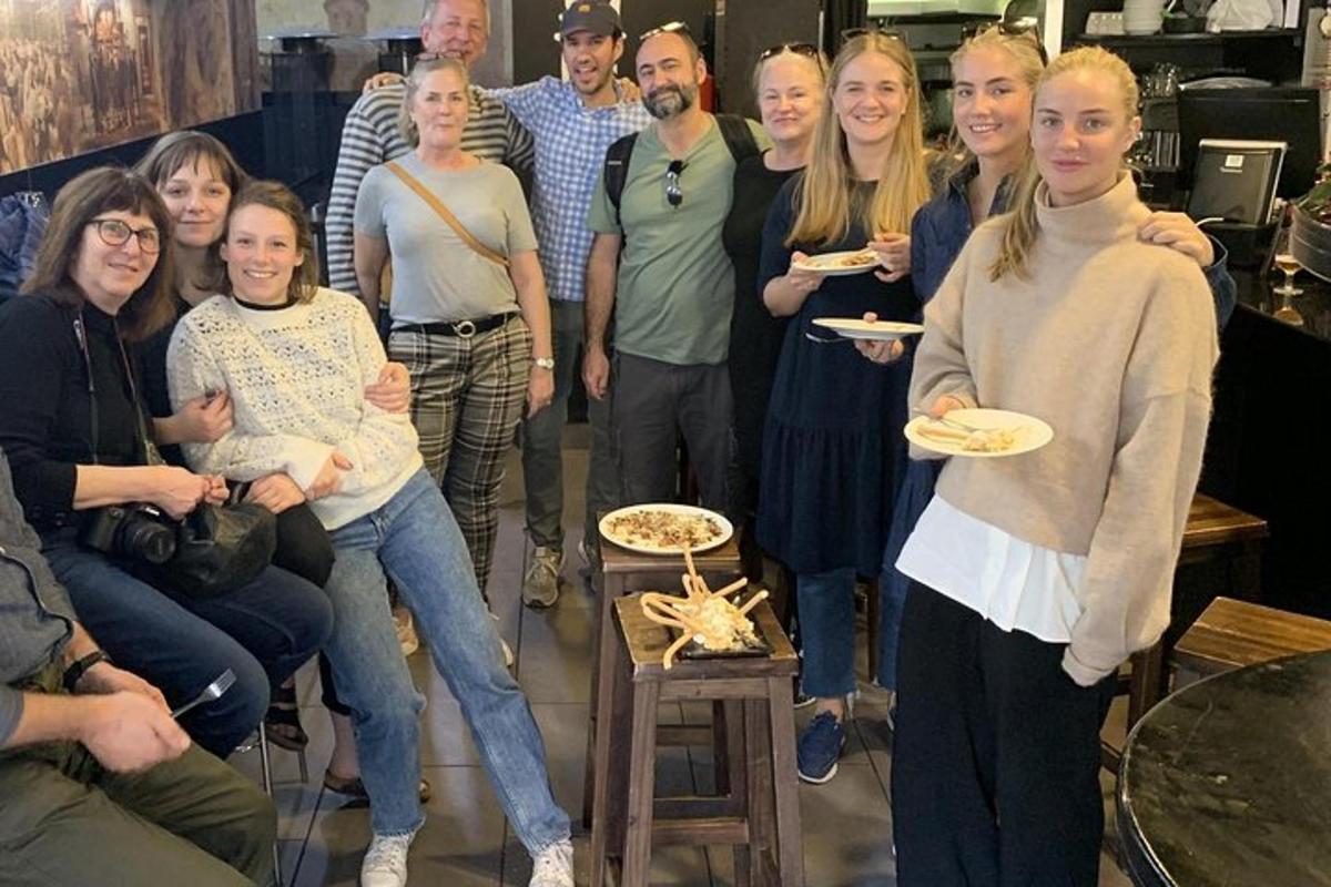 a group of people are posing for a picture