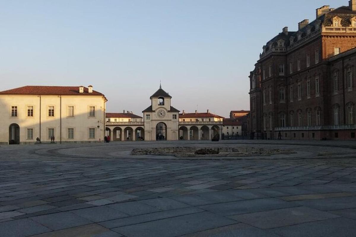 a city square with buildings and a clock tower