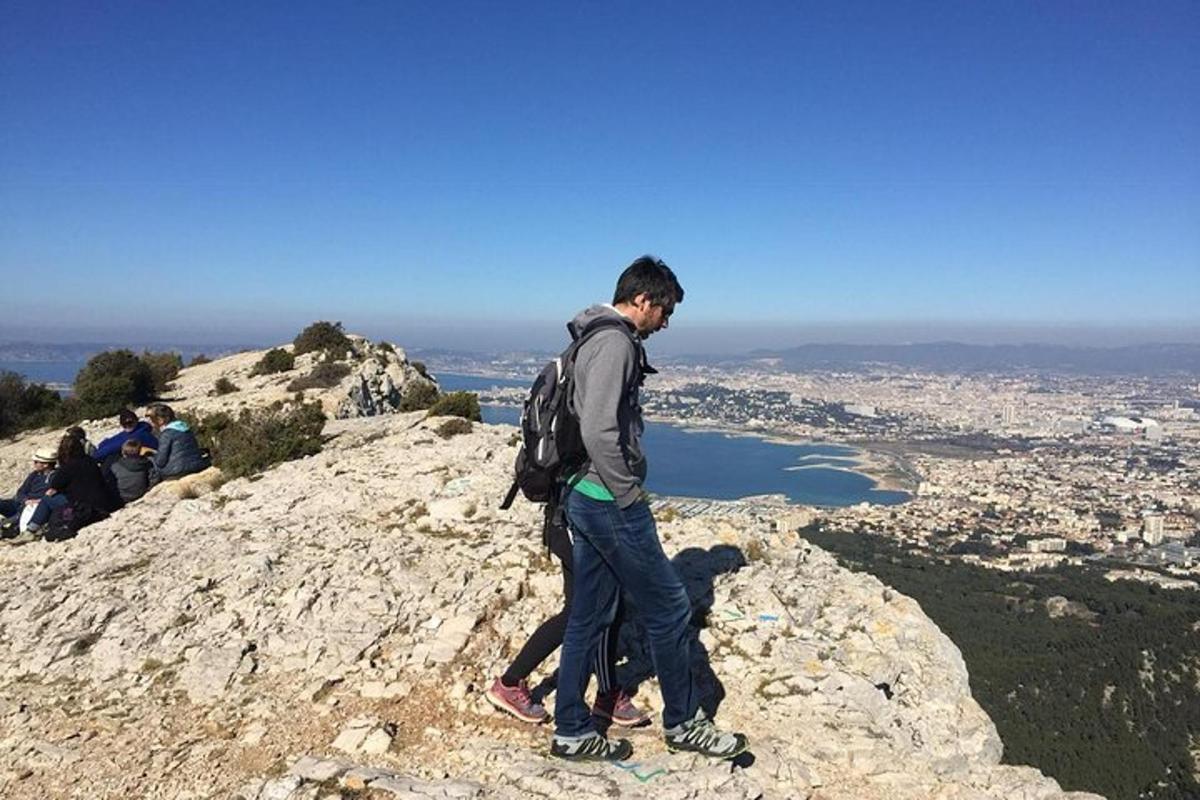a man standing on top of a mountain