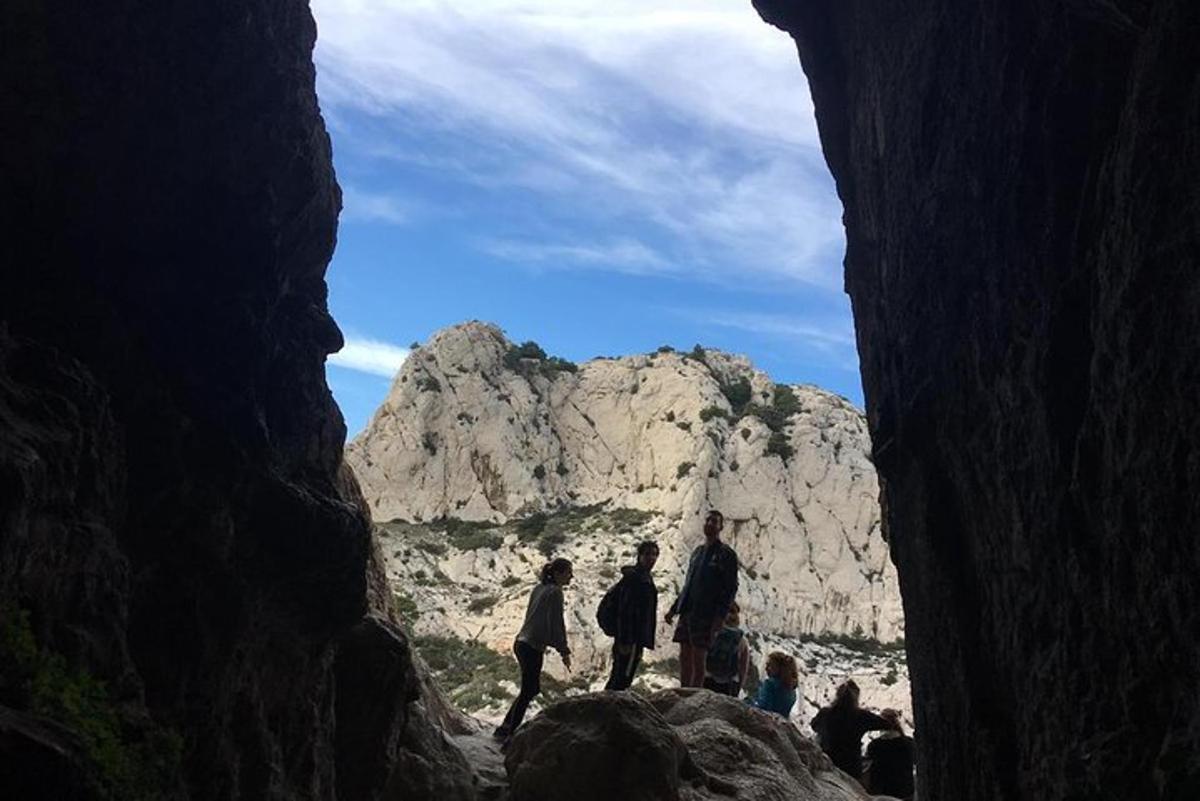 a group of people standing in a cave