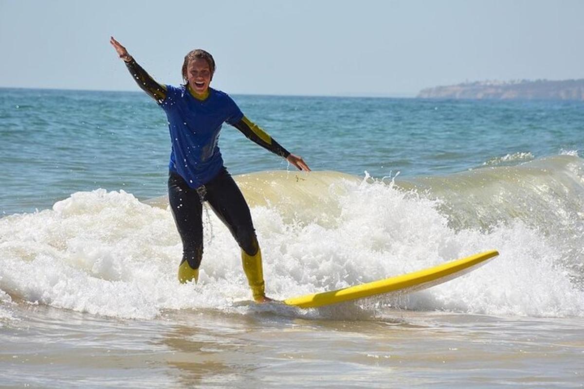 a man riding a wave on a surfboard in the ocean
