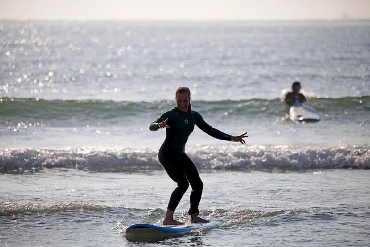 a man riding a wave on a surfboard in the ocean