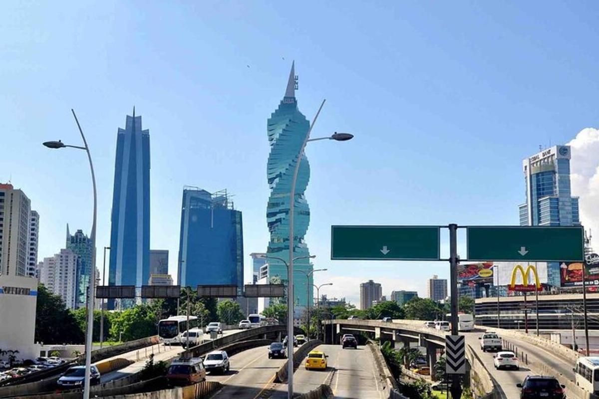 a view of a busy city with a tall building