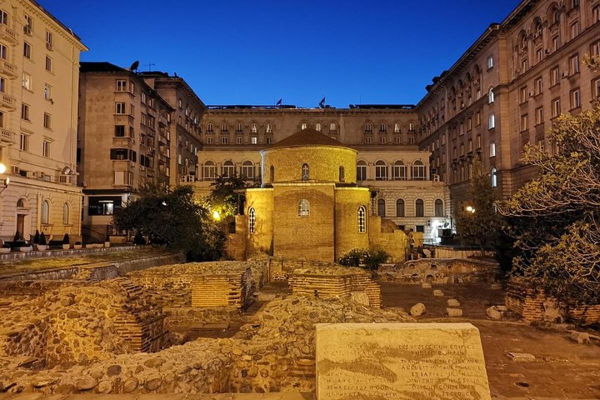 a building in the middle of a city at night