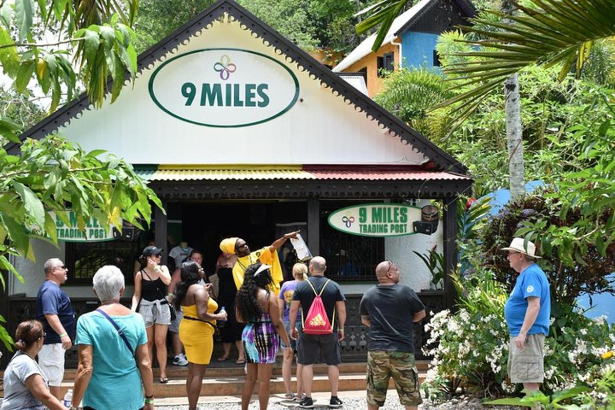 a group of people standing outside of a restaurant