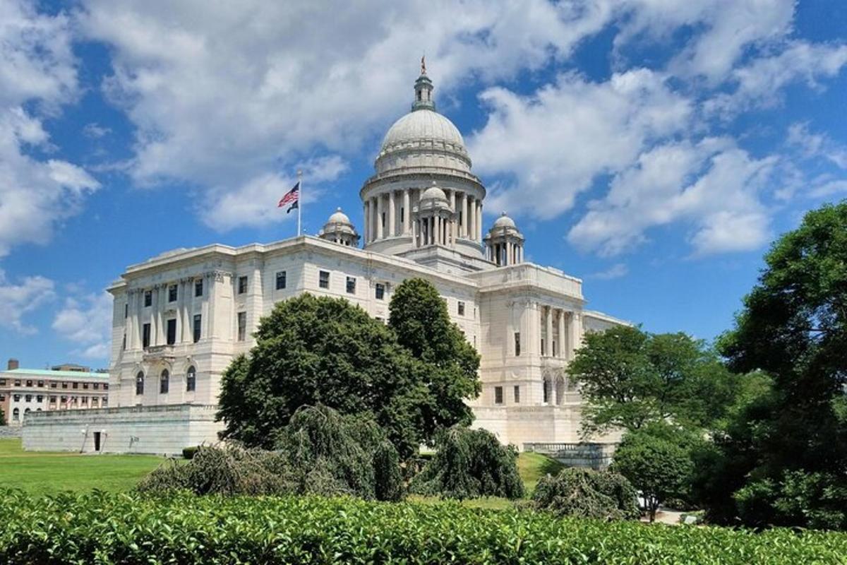 a white building with a flag on top of it