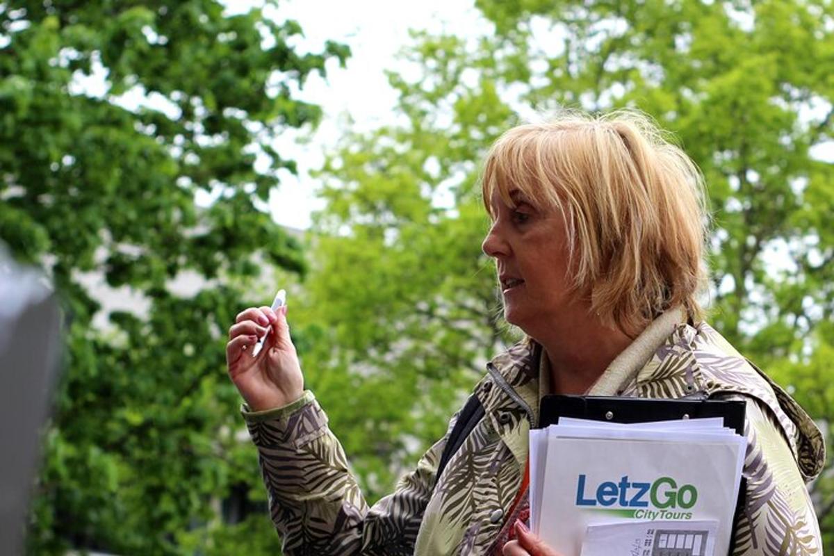 a woman holding a cigarette in her hand