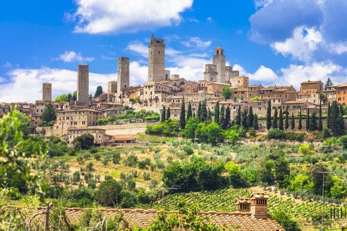 a view of the ruins of a city on a hill