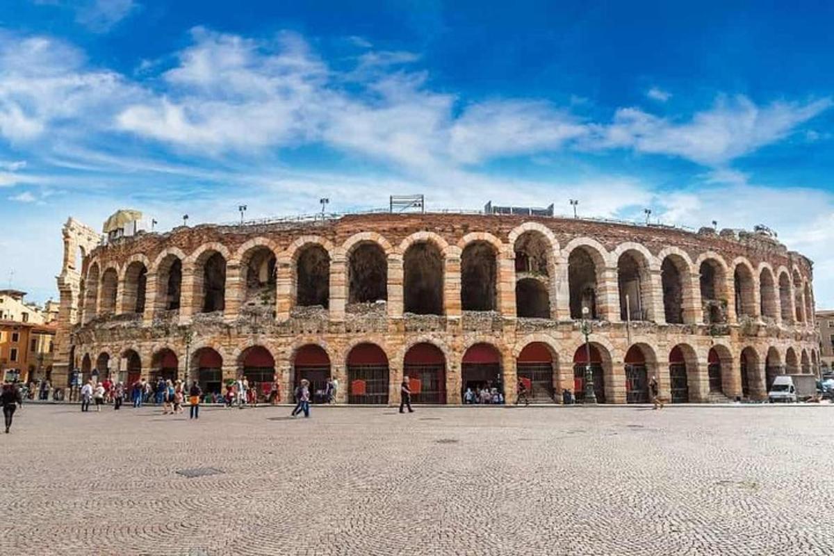 a large building with people walking in front of it