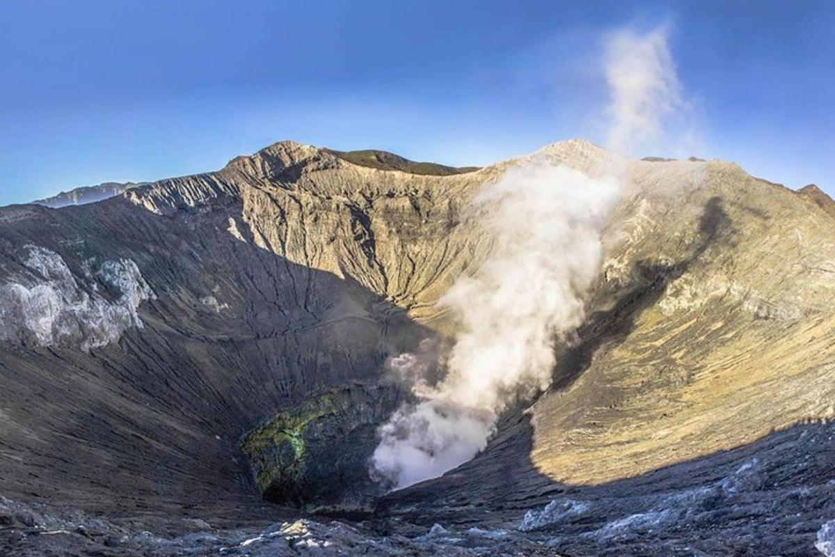 a mountain with smoke coming out of it