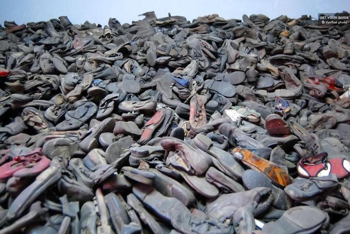a large pile of figurines on a beach