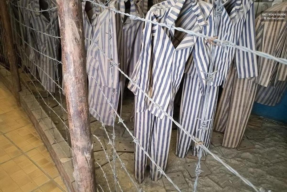 a bunch of umbrellas in a cage