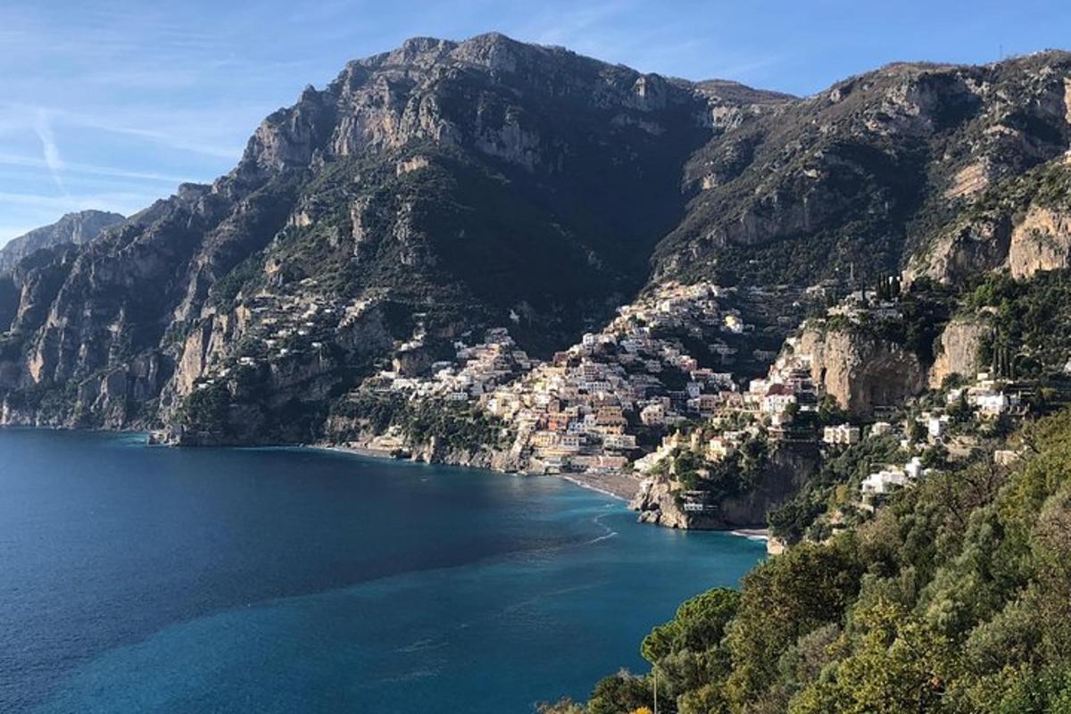 a view of a mountain with a body of water