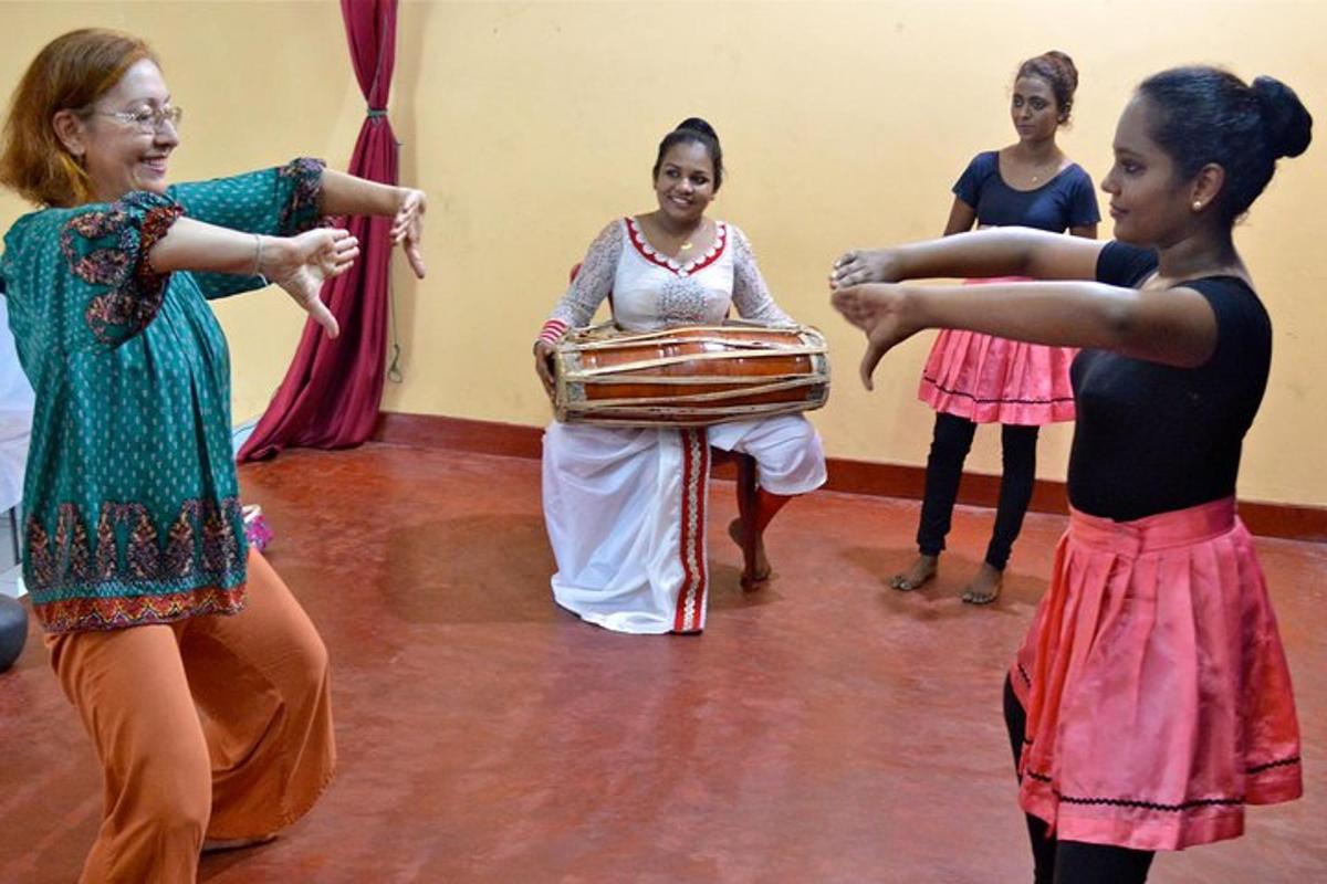 a group of women dancing in a dance class
