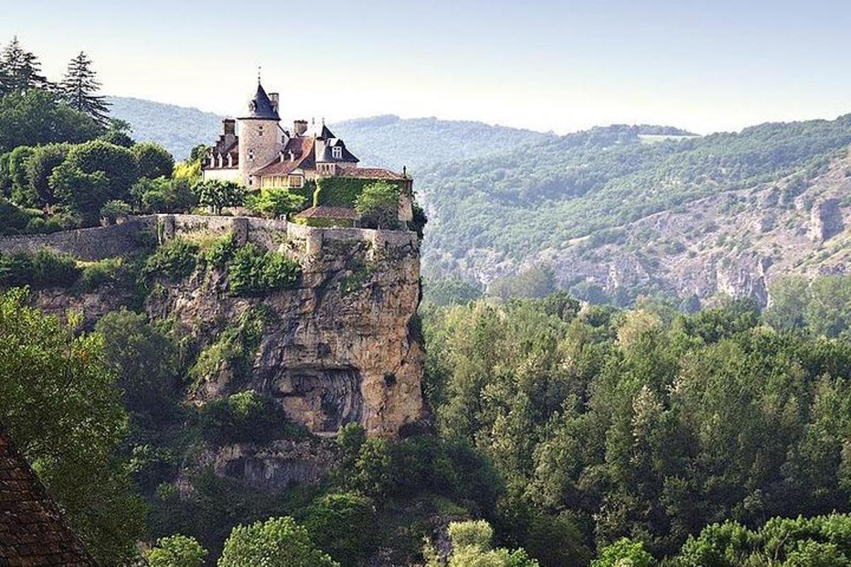 a castle sitting on top of a mountain