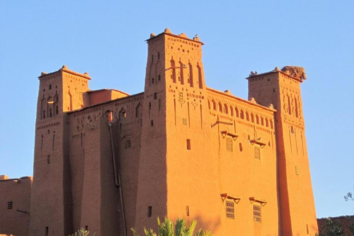 a large building with two towers on top of it