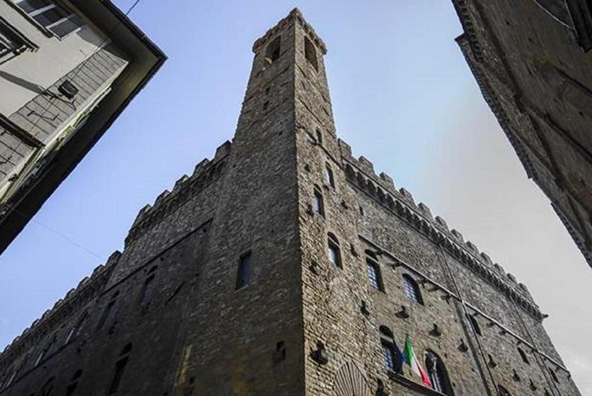 a tall brick building with a tall tower