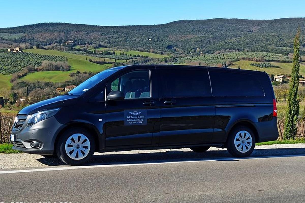 a black van parked on the side of a road